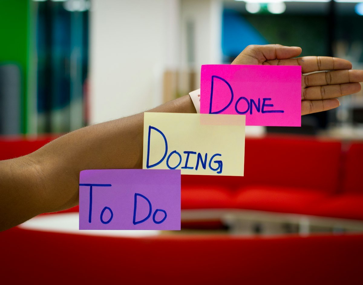 Kanban-style board for prioritizing product work from support ticket clusters